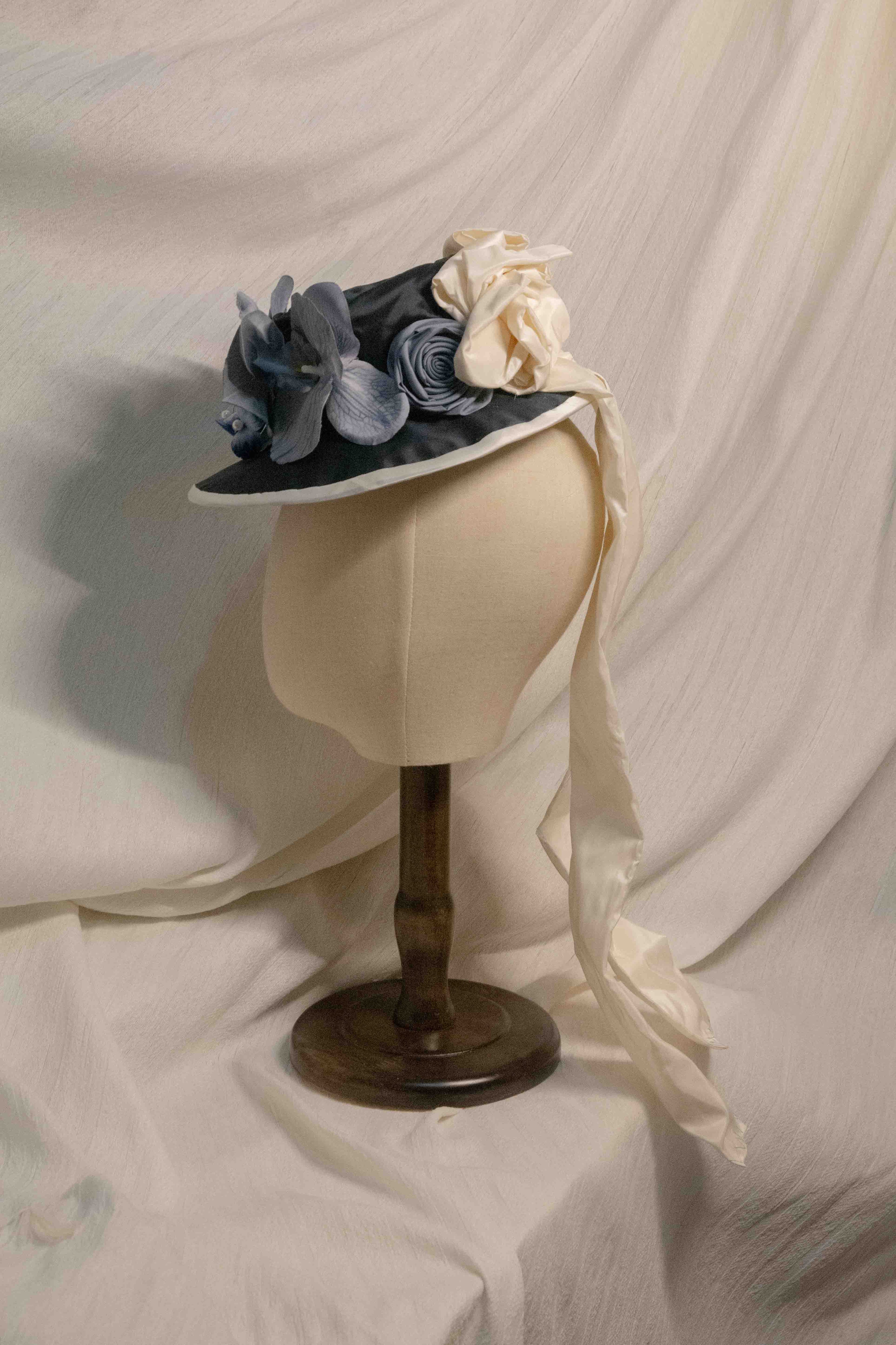 Victorian-era Satin Bonnet with Blue Orchids, Pearl Accents & Cream Satin Drape ARHA1039