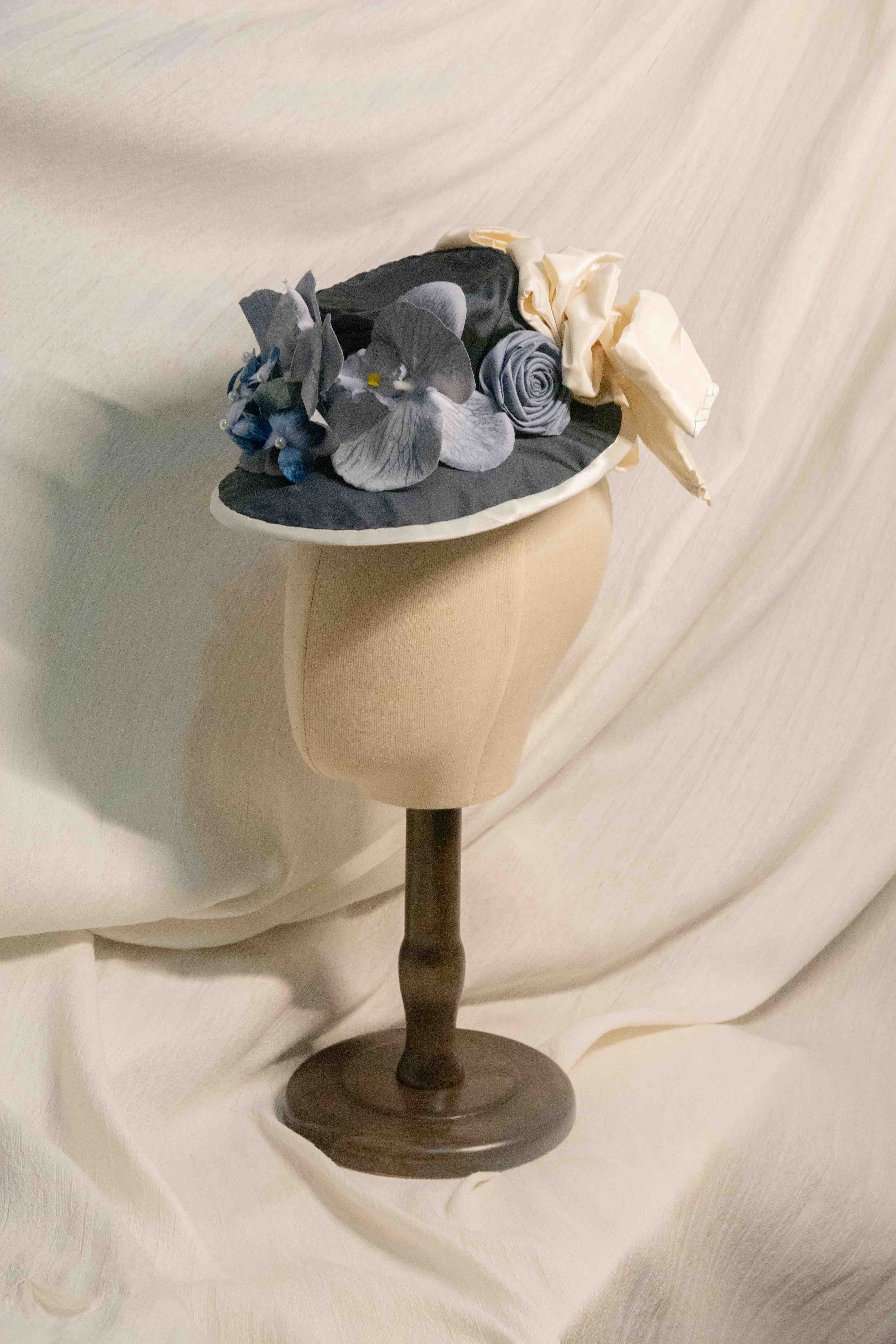 Victorian-era Satin Bonnet with Blue Orchids, Pearl Accents & Cream Satin Drape ARHA1039