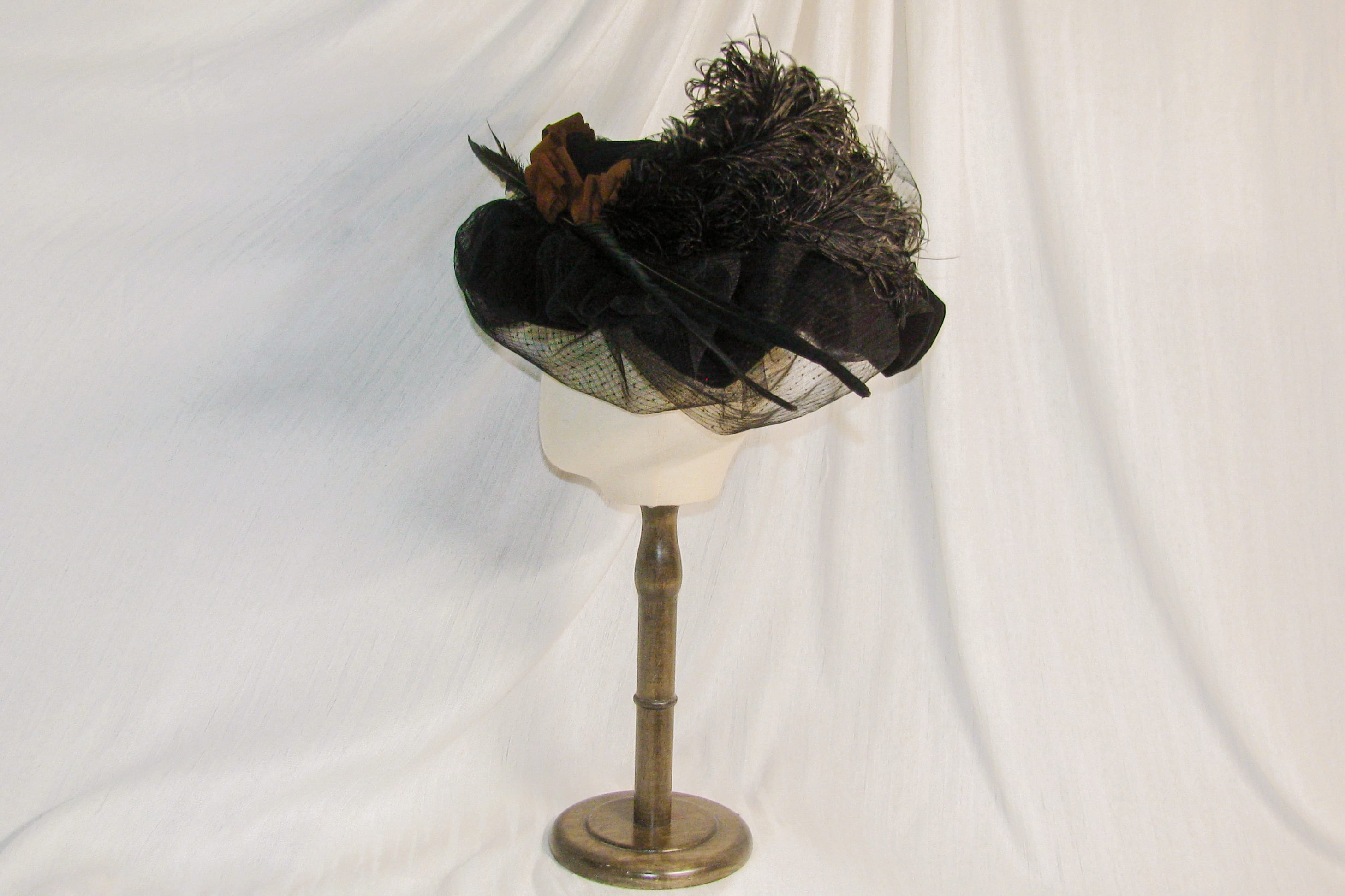 Victorian Edwardian Wide-Brimmed Hat with Brown Satin Rosette and Exotic Feather Details  ARHA1036