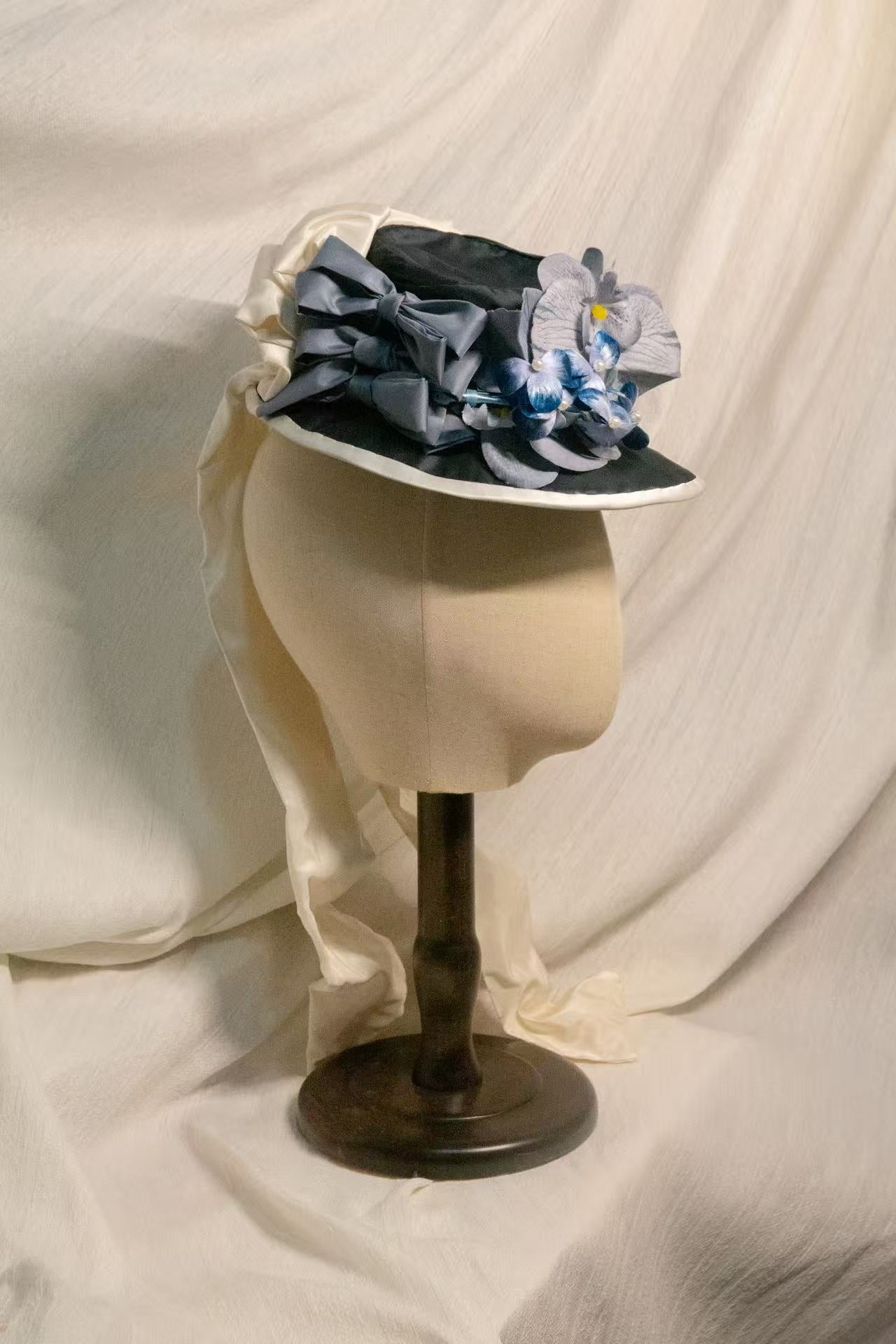 Victorian-era Satin Bonnet with Blue Orchids, Pearl Accents & Cream Satin Drape ARHA1039