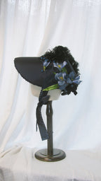 Regency-Style Black Satin Bonnet with Blue Floral & Feather Embellishments – Elegant Gothic-Headpiece ARHA1008