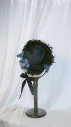 Regency-Style Black Satin Bonnet with Blue Floral & Feather Embellishments – Elegant Gothic-Headpiece ARHA1008