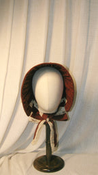 Victorian Burgundy Fabric Bonnet with Ruffled Details & Ivory Lace Bows – Classic 19th-Century Style Headpiece ARHA1009